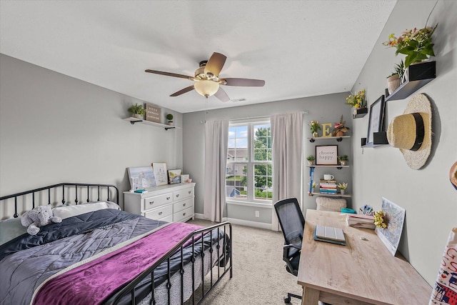 204 Campbell St, Tolono, IL 61880 - bedroom featuring light colored carpet, ceiling fan, and a desk