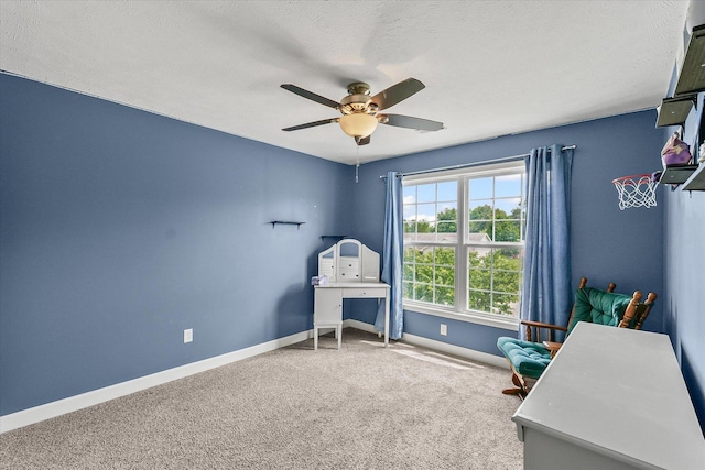 204 Campbell St, Tolono, IL 61880 - living area featuring a ceiling fan, carpet floors, and a textured ceiling