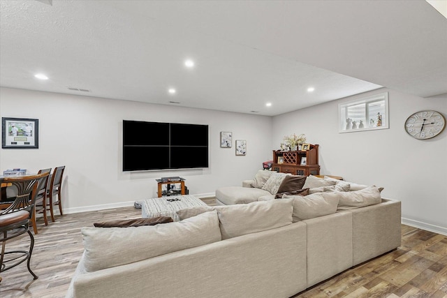 204 Campbell St, Tolono, IL 61880 - living room with wood finished floors and recessed lighting