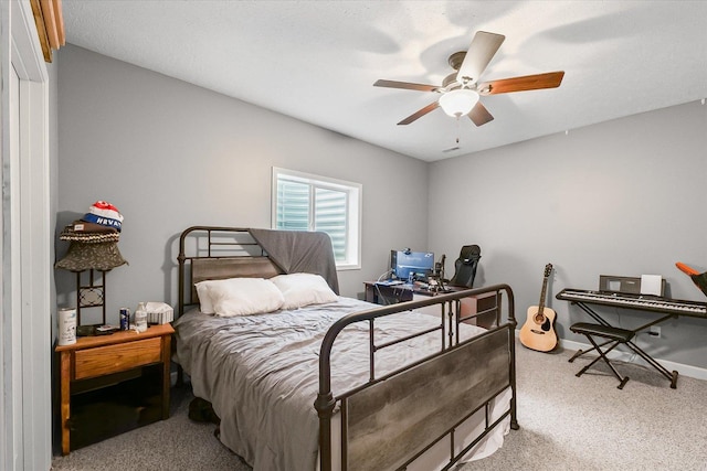 204 Campbell St, Tolono, IL 61880 - carpeted bedroom featuring ceiling fan and baseboards