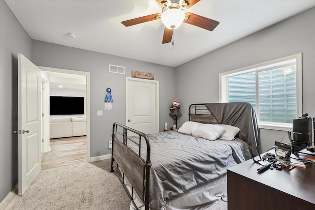 204 Campbell St, Tolono, IL 61880 - bedroom featuring light carpet and ceiling fan