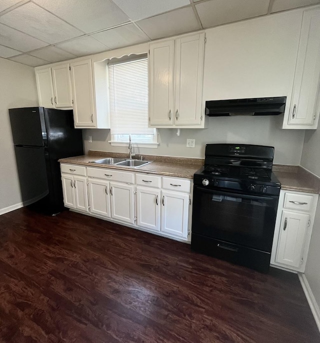 21142 Locust St, Matteson, IL 60443 - kitchen with black appliances, premium range hood, dark wood-style flooring, white cabinets, and a paneled ceiling