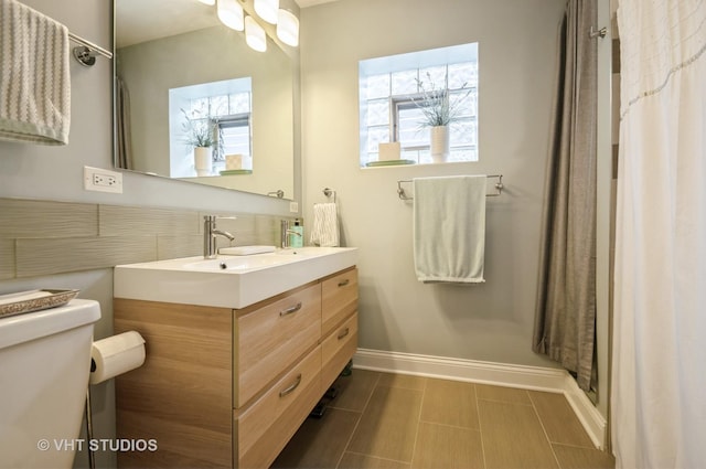5128 W Carmen Ave, Chicago, IL 60630 - bathroom featuring vanity and curtained shower