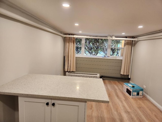5128 W Carmen Ave, Chicago, IL 60630 - interior space with light wood finished floors, a baseboard radiator, and recessed lighting