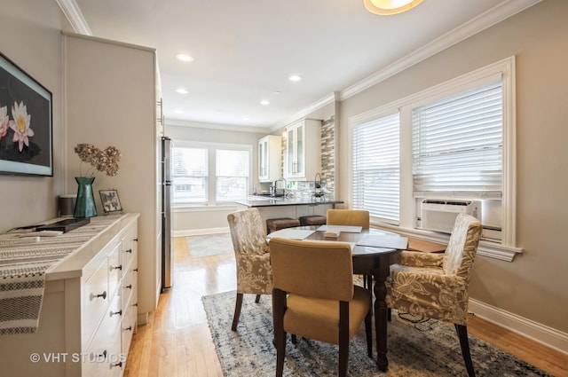 5128 W Carmen Ave, Chicago, IL 60630 - dining space with crown molding, light wood-type flooring, cooling unit, and recessed lighting