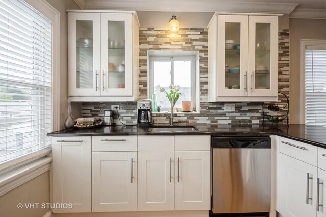 5128 W Carmen Ave, Chicago, IL 60630 - bar featuring stainless steel dishwasher, decorative backsplash, and crown molding