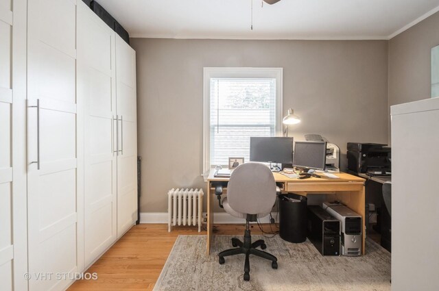 5128 W Carmen Ave, Chicago, IL 60630 - home office featuring radiator heating unit, light wood-style floors, crown molding, and a ceiling fan
