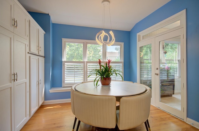 332 Stonemill Ln, Oswego, IL 60543 - dining area featuring light wood-style flooring, healthy amount of natural light, and a chandelier