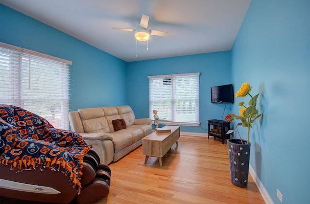 332 Stonemill Ln, Oswego, IL 60543 - living room with wood finished floors and a ceiling fan