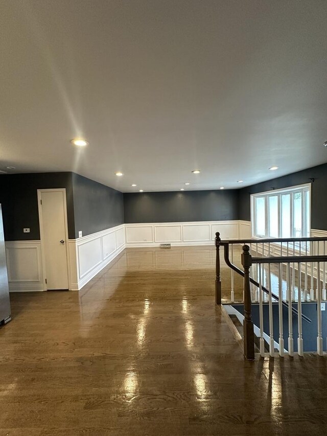 360 Chappel Ave, Calumet City, IL 60409 - corridor featuring wainscoting, a decorative wall, wood finished floors, and recessed lighting