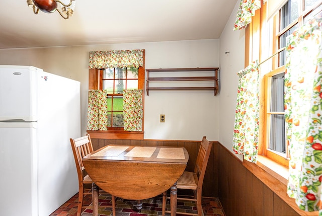 244 S Division St, Galena, IL 61036 - dining space featuring brick floors