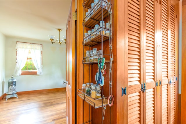 244 S Division St, Galena, IL 61036 - detailed view of wood finished floors and a chandelier