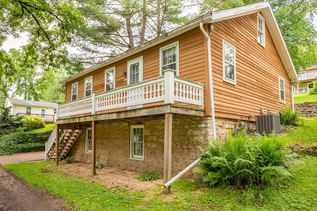 244 S Division St, Galena, IL 61036 - view of side of home featuring stairway and a wooden deck