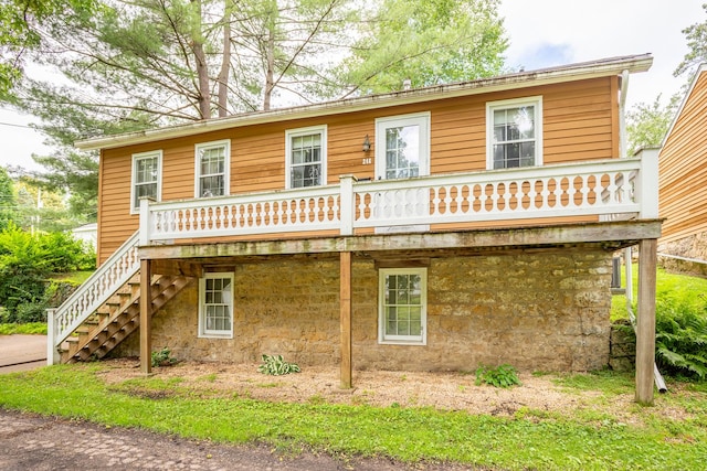 244 S Division St, Galena, IL 61036 - view of front facade featuring a deck and stairs