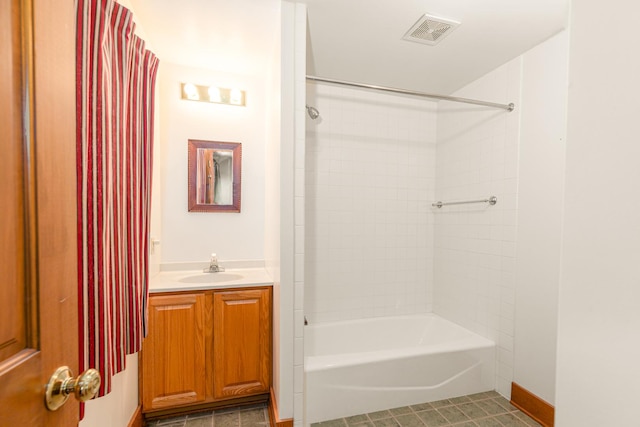 244 S Division St, Galena, IL 61036 - full bath featuring vanity, tub / shower combination, and tile patterned flooring