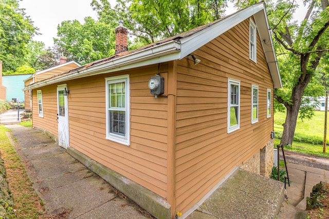 244 S Division St, Galena, IL 61036 - view of property exterior featuring a chimney