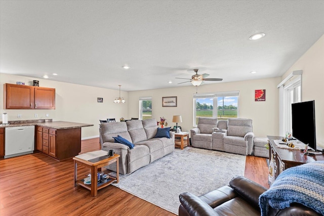 209A Evergreen St, Gifford, IL 61847 - living room featuring light wood-type flooring, ceiling fan, a chandelier, and recessed lighting