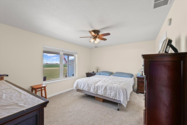 209A Evergreen St, Gifford, IL 61847 - bedroom with light carpet and ceiling fan
