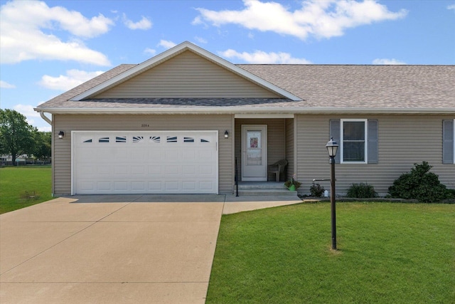 209A Evergreen St, Gifford, IL 61847 - view of front of house with driveway, a front lawn, and a shingled roof