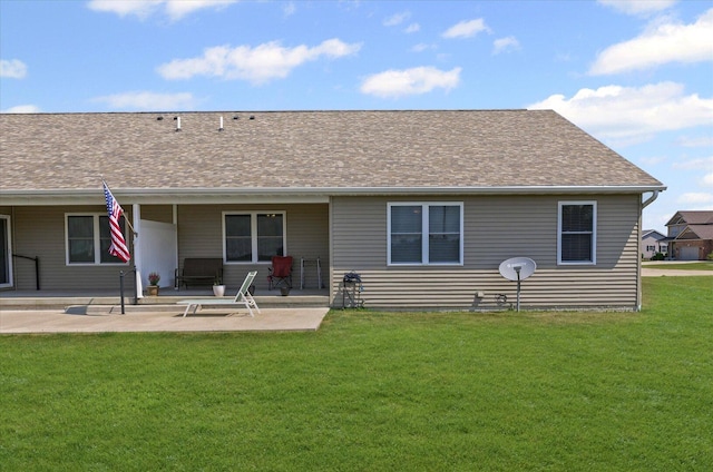 209A Evergreen St, Gifford, IL 61847 - back of house with a lawn, a patio area, and a shingled roof