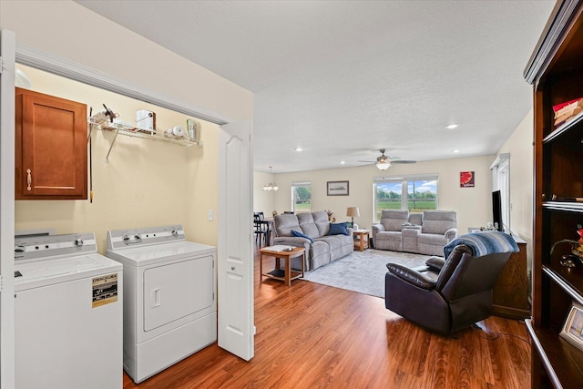 209A Evergreen St, Gifford, IL 61847 - washroom featuring light wood finished floors, a ceiling fan, washer and clothes dryer, recessed lighting, and a chandelier