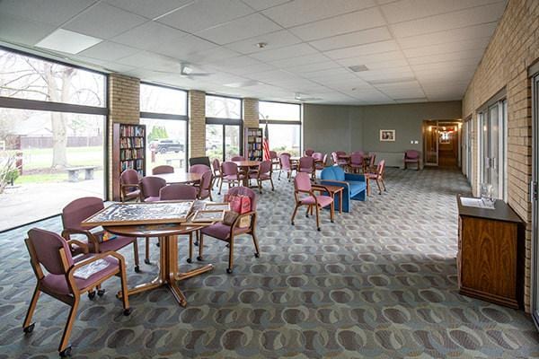 110 W Butterfield Rd Unit 405S, Elmhurst, IL 60126 - carpeted dining room featuring a drop ceiling and floor to ceiling windows