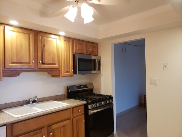 110 W Butterfield Rd Unit 405S, Elmhurst, IL 60126 - kitchen featuring appliances with stainless steel finishes, ceiling fan, ornamental molding, brown cabinets, and light countertops