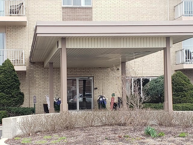 110 W Butterfield Rd Unit 405S, Elmhurst, IL 60126 - entrance to property with brick siding
