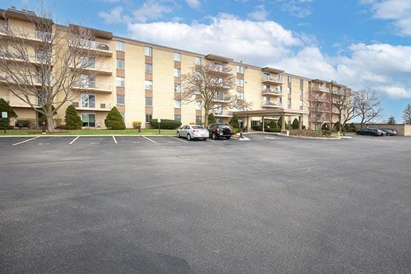 110 W Butterfield Rd Unit 405S, Elmhurst, IL 60126 - view of apartment building / complex with uncovered parking