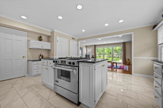 912 Morningside Dr, Lake Forest, IL 60045 - kitchen with gas range, light marble finish flooring, white cabinetry, recessed lighting, and a kitchen island
