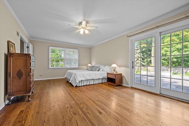 912 Morningside Dr, Lake Forest, IL 60045 - bedroom featuring access to exterior, crown molding, wood finished floors, and a ceiling fan