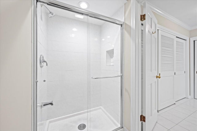 912 Morningside Dr, Lake Forest, IL 60045 - full bathroom featuring a stall shower, ornamental molding, tile patterned flooring, and a closet