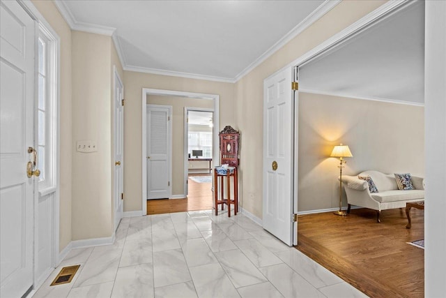 912 Morningside Dr, Lake Forest, IL 60045 - entryway with crown molding and light marble finish flooring
