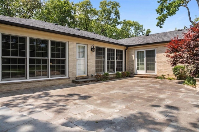 912 Morningside Dr, Lake Forest, IL 60045 - back of house with a patio area and brick siding