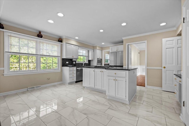 912 Morningside Dr, Lake Forest, IL 60045 - kitchen with stainless steel appliances, light marble finish floors, dark countertops, recessed lighting, and ornamental molding