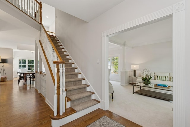 590 Oxford Ln, Lindenhurst, IL 60046 - stairway featuring plenty of natural light and wood finished floors