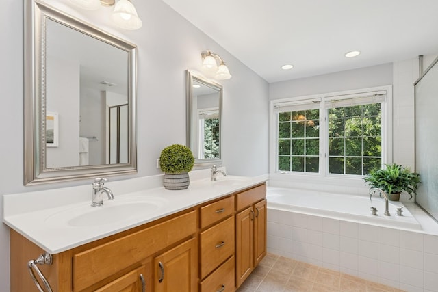 590 Oxford Ln, Lindenhurst, IL 60046 - bathroom featuring double vanity, a bath, tile patterned floors, recessed lighting, and a shower with door