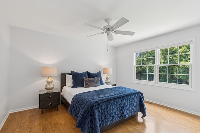 590 Oxford Ln, Lindenhurst, IL 60046 - bedroom featuring wood finished floors and a ceiling fan