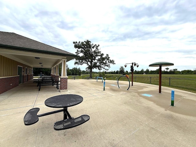 590 Oxford Ln, Lindenhurst, IL 60046 - view of property's community with a patio area