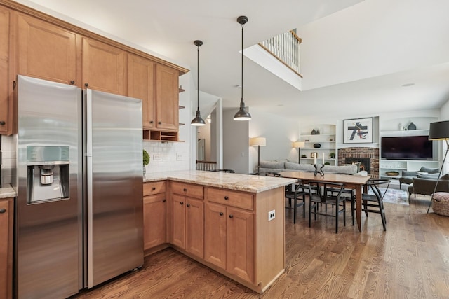 590 Oxford Ln, Lindenhurst, IL 60046 - kitchen with stainless steel fridge, wood finished floors, a peninsula, and open floor plan