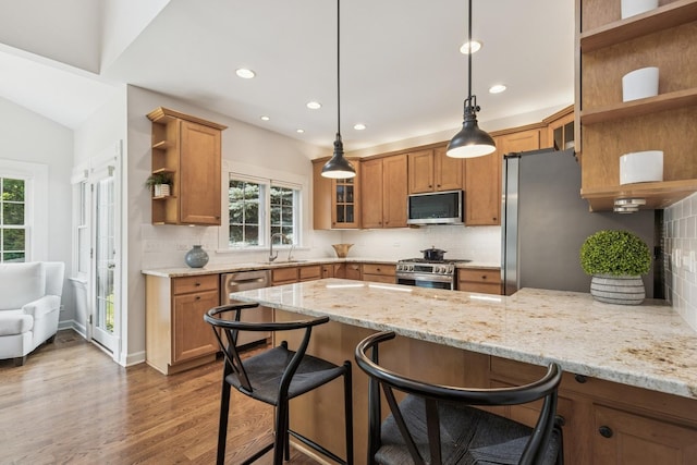 590 Oxford Ln, Lindenhurst, IL 60046 - kitchen featuring open shelves, stainless steel appliances, brown cabinets, a peninsula, and backsplash