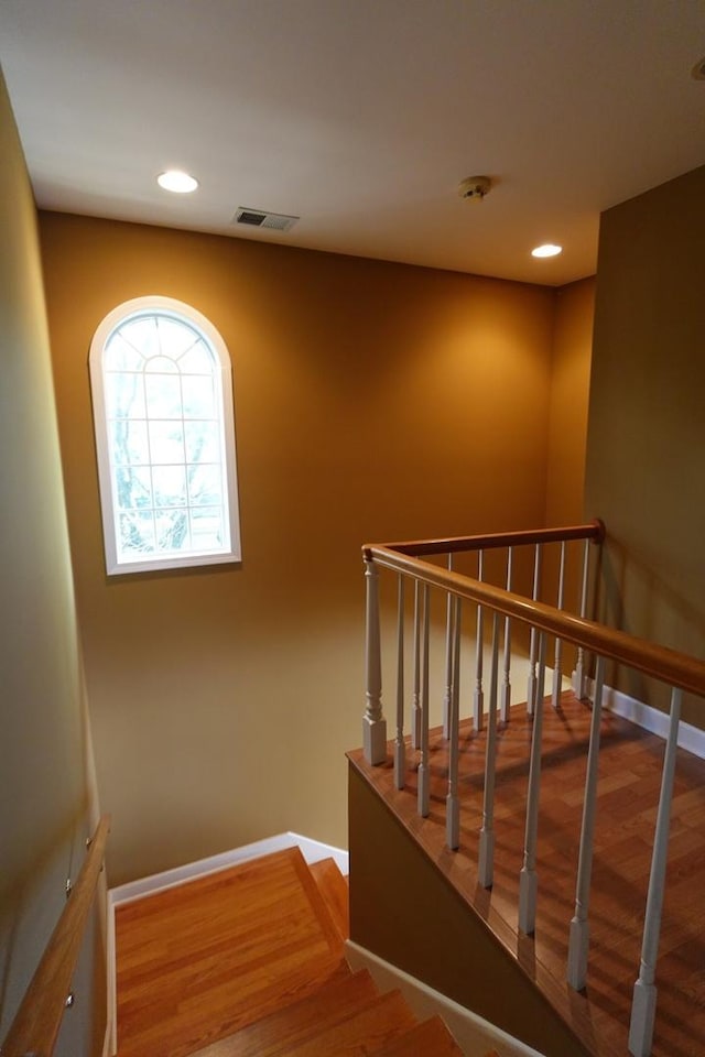 3533 N Natoma Ave, Chicago, IL 60634 - stairway with wood finished floors and recessed lighting