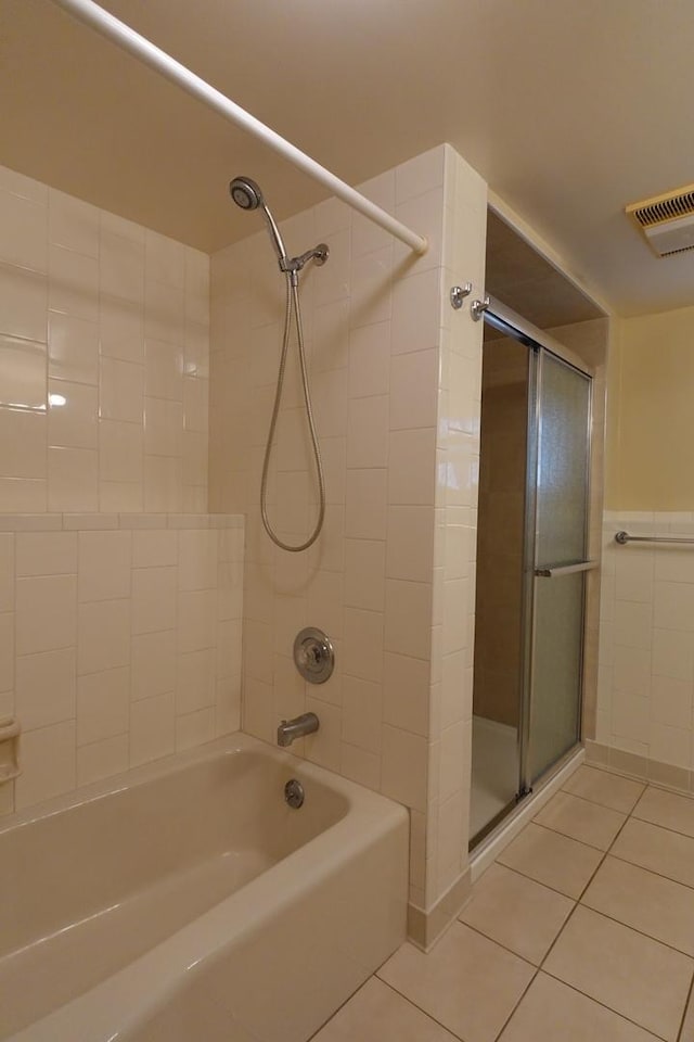 3533 N Natoma Ave, Chicago, IL 60634 - bathroom with tile patterned flooring and tub / shower combination