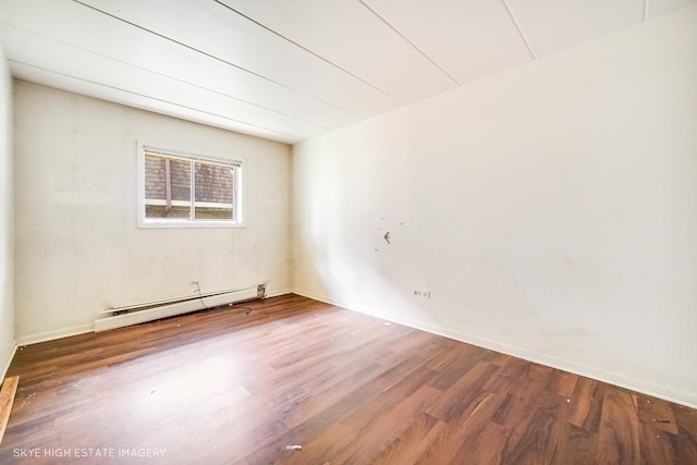 128 Bailey Rd Unit G, Naperville, IL 60565 - empty room with a baseboard radiator and wood finished floors