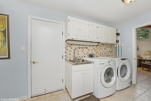 20830 W Exeter Rd, Kildeer, IL 60047 - laundry area with cabinet space, washing machine and clothes dryer, and light tile patterned floors