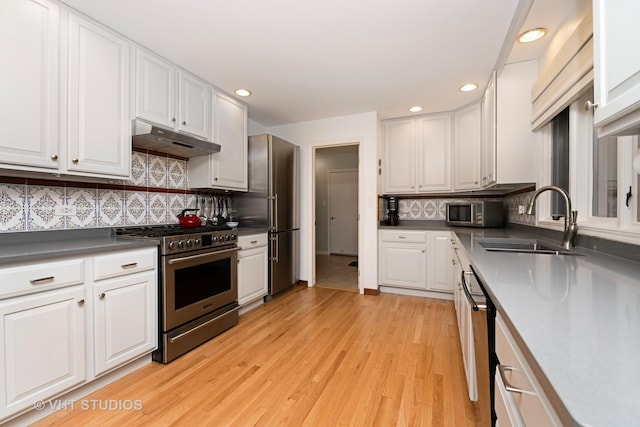20830 W Exeter Rd, Kildeer, IL 60047 - kitchen with stainless steel appliances, under cabinet range hood, white cabinetry, and recessed lighting