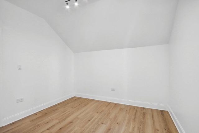 5048 W Superior St, Chicago, IL 60644 - bonus room with lofted ceiling and light wood-type flooring