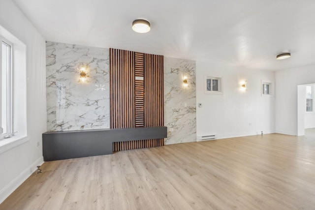 5048 W Superior St, Chicago, IL 60644 - empty room with wood finished floors and a baseboard radiator