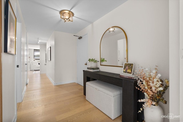 1410 N State Pkwy Unit 5B, Chicago, IL 60610 - hallway featuring light wood-style flooring and baseboards