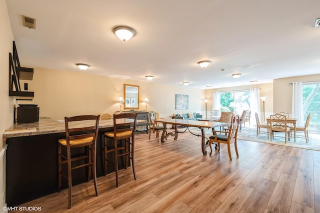 90 E Franklin Pl Unit 106, Lake Forest, IL 60045 - dining room featuring light wood-style floors